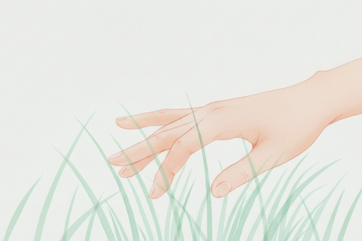 Bare feet standing on grass